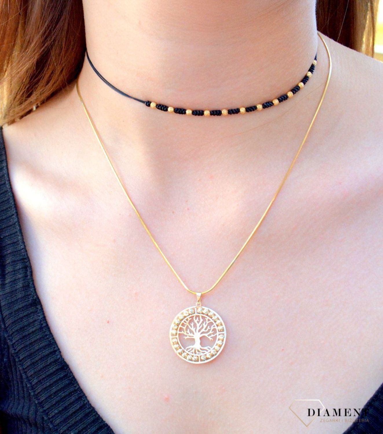 Złota zawieszka pr 333 drzewko szczęścia ZA 6331 333. Złota zawieszka w kształcie drzewka na szczęście ozdobiona grawerowanymi kuleczkami. Elegancki wisiorek wykonany z próby 333 żółtego złota. Ta unikalna biżuteria, która zachwyci każd.jpg